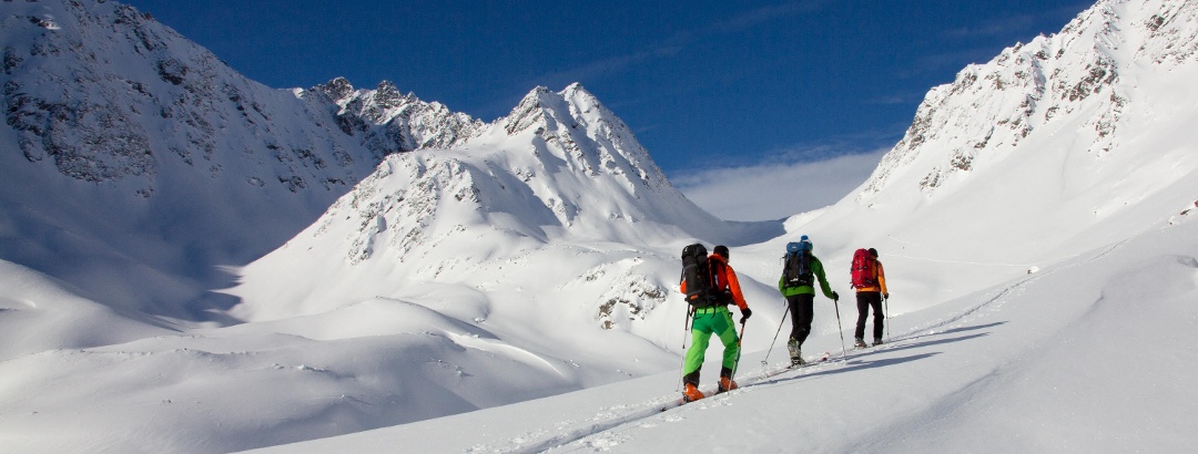 Ski tour in the snowy mountains